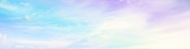 istock Beautiful rainbow pastel color with clouds and blue sky 1935985468