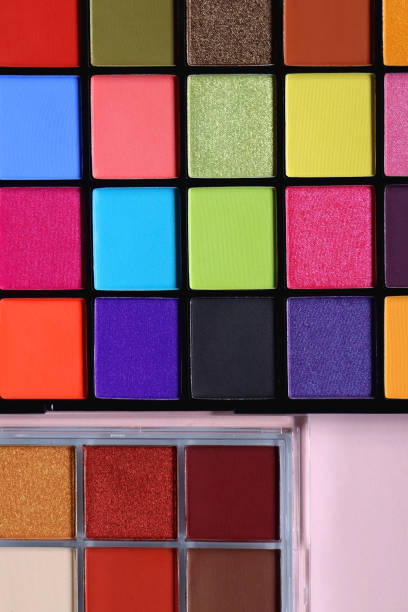 istock Eyeshadow Palettes on Pink Background 1935993751