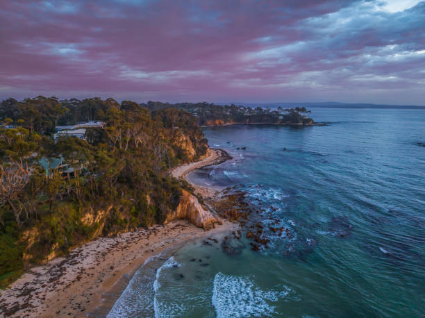 istock Summer Sunrise Seascape with Rain Clouds 1936008941