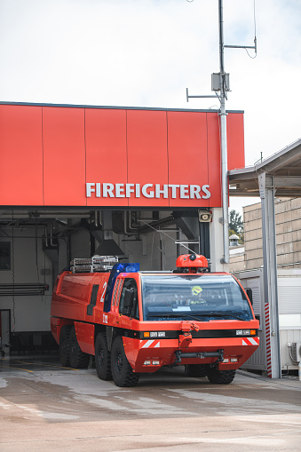 Coopers Beach, New Zealand - Nov 14 2012: Fire and Emergency New Zealand Fire engine parking in a fire station. Fire and Emergency New Zealand is New Zealand's main firefighting and emergency services body.