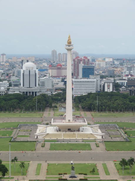 istock Indonesia's National Monument (Monas) Seen Aligned with its Peak 1936141952