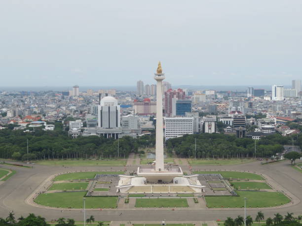 istock Indonesia's National Monument (Monas) Seen Aligned with its Peak 1936141953