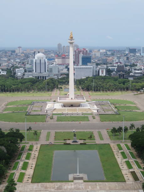 istock Indonesia's National Monument (Monas) Seen Aligned with its Peak 1936141964