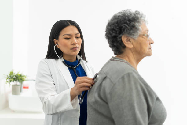 istock Respiratory health check for elderly patient 1936218501
