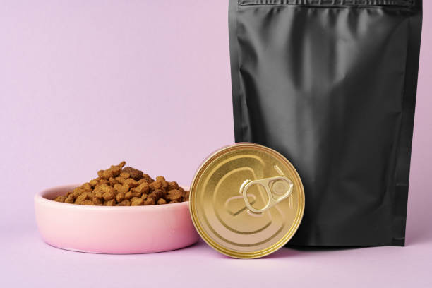 istock Cat food on pink background in studio 1936226108