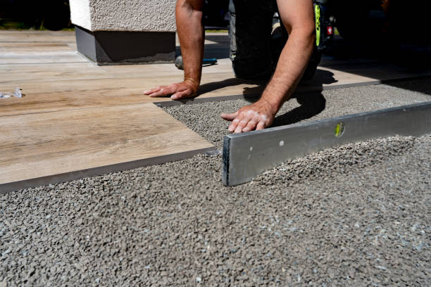 istock Natural stone slabs laid on fine chippings and a gravel base layer 1936228299