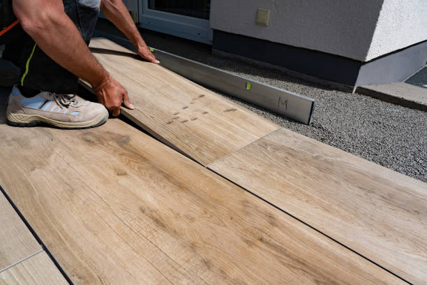 istock Natural stone slabs laid on fine chippings and a gravel base layer 1936228310