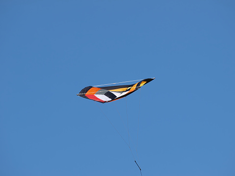 Colorful High Performance Kite Flying In Blue Sky Berkeley California