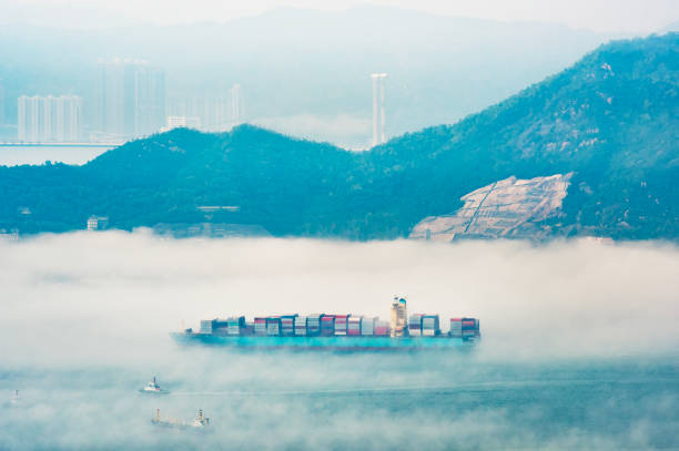 Aerial view of cargo ship in fog