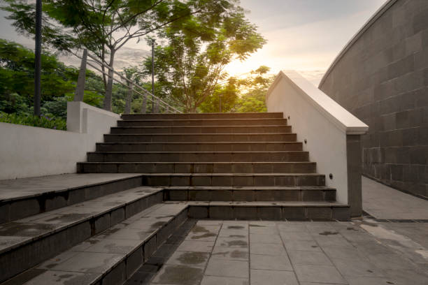 Wide staircase in the park with a sunset scene background