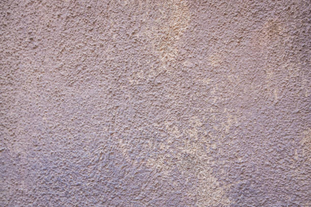 istock Abstract stucco background texture with variations in the color 1936381357