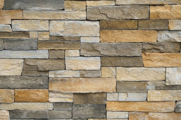 istock facade view of old stone wall background 1936477627