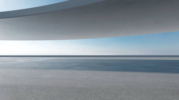 istock 3d render of abstract wavy futuristic architecture with concrete floor. 1936486486