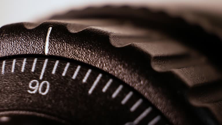 Micrometer scale on a CNC machine. Extreme precision. Production of artillery shells