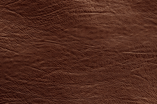 Dark brown leather texture background with seamless pattern and high resolution. photo