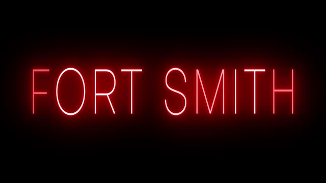 Glowing and blinking red retro neon sign for FORT SMITH