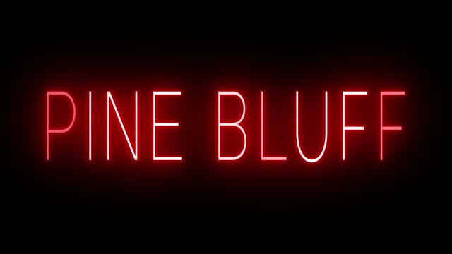 Glowing and blinking red retro neon sign for PINE BLUFF