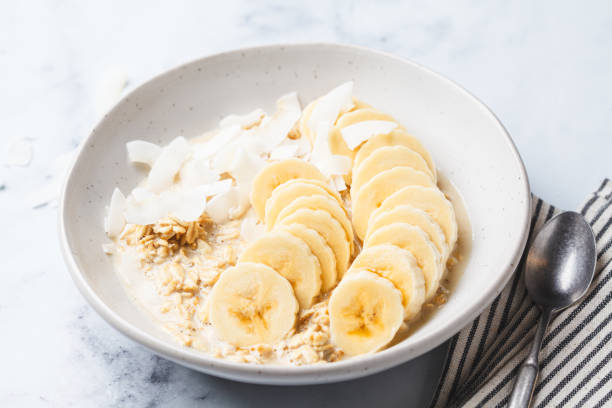 istock Overnight oatmeal with banana and coconut chips. 1936548219