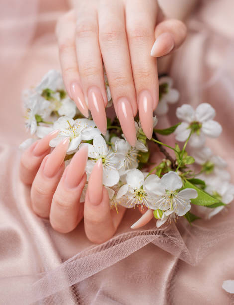 istock Elegant pastel pink natural manicure. 1936551935
