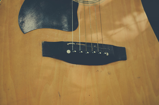 old acoustic guitar close up