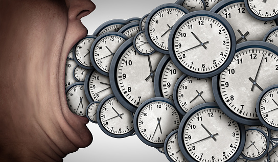 Management Of Time and time crunch pressure or deadline stress as a person with clocks representing the business or life pressures of scheduling and productivity.