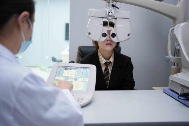 istock Ophthalmologist checks patient's vision 1936609149