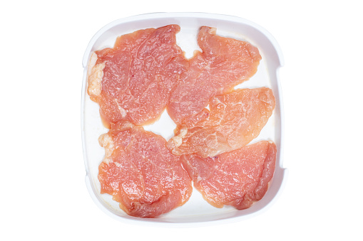 Fresh raw offal sliced on square plate isolated on white background, hot pot ingredients.