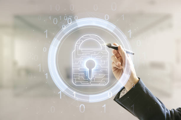 istock Man hand with pen draws virtual creative lock symbol and microcircuit illustration on blurred office background. Protection and firewall concept. Multiexposure 1936655409