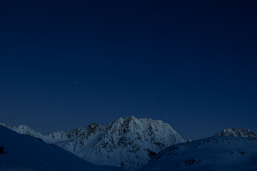 Dark blue or the last light before all the stars come out and all light is gone for the day. Shot from Maighels hut in the region Oberalppass, Andermatt, Switzerland.