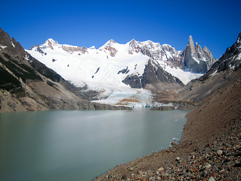 Glacial lake with Fitz Roy peak and Cerro Torre mountain on background, Patagonia