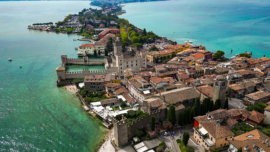 Aerial view of Scaligero Castle (Sirmione) on Lake Garda in Northern Italy, aerial view of the shoreline of Lake Garda, the largest Lake Garda in Italy, aerial view of Sirmione with Castello Scaligero on Lake Garda in Italy, Aerial view Sirmione town