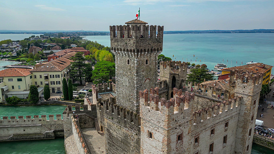 Aerial view of Scaligero Castle (Sirmione) on Lake Garda in Northern Italy, aerial view of the shoreline of Lake Garda, the largest Lake Garda in Italy, aerial view of Sirmione with Castello Scaligero on Lake Garda in Italy, Aerial view Sirmione town