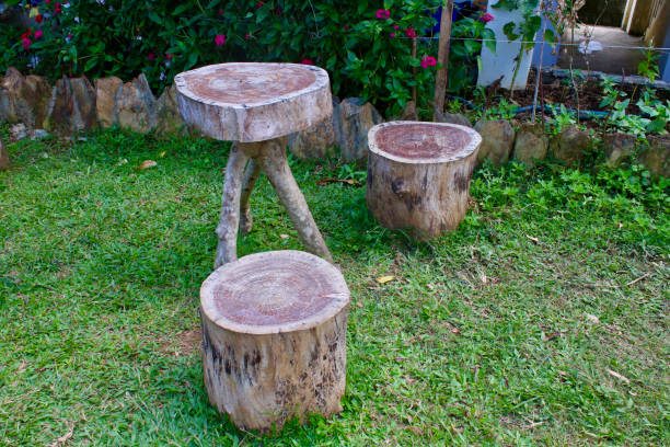 istock Homemade wooden table and chairs from stumps. 1936708595