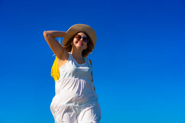 Beautiful woman walking on beach