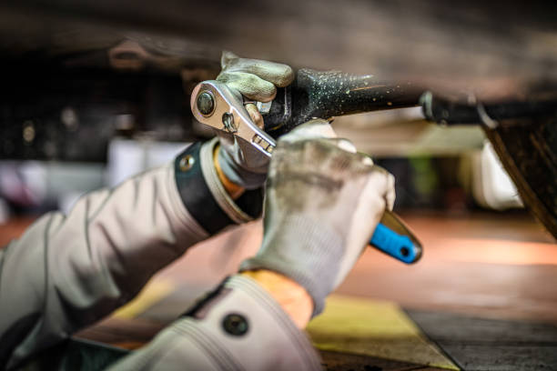 istock Truck mechanic working in garage 1936758103
