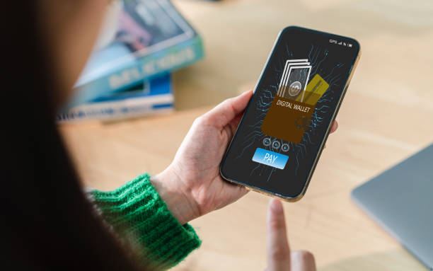 istock Human use smartphone with digital wallet, online banking digital technology, mobile banking, shopping, payment, finance, bank, withdraw money, E-wallet, credit card, financial and business online 1936794599