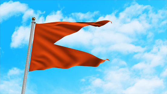 This stock image capturing a colored flag gracefully hoisted on a flagpole, set against the vast expanse of the sky at one of the highest points on Earth's surface. This mesmerizing view combines the elegance of the flag's movement with the awe-inspiring backdrop of the sky, creating a visual masterpiece that symbolizes pride, freedom, or achievement. Whether for patriotic events, symbolic representations.