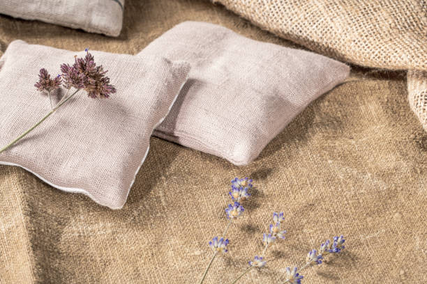 istock Country style decor with peasant pillows and dried lavender stems on burlap 1936849109