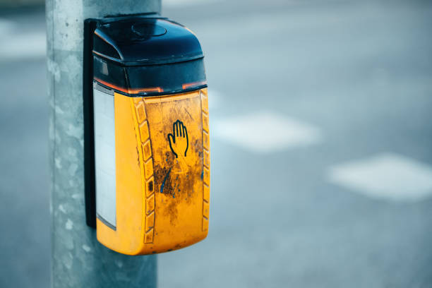 istock Dirty old traffic light push button on pedestrian crossing 1936878153