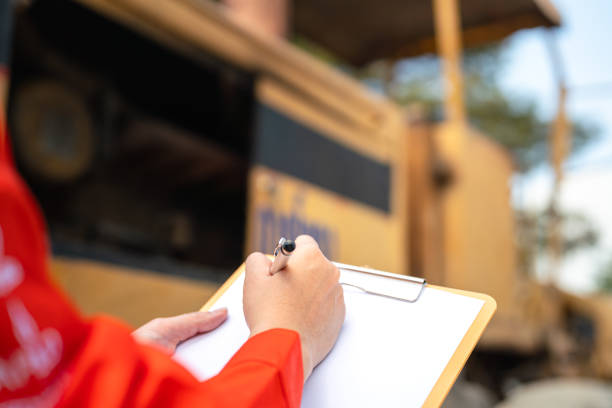 istock Inspection the road compactor machinery. 1936898715