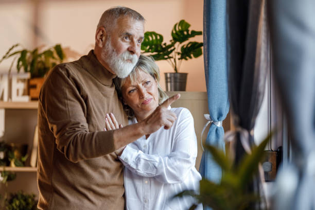 istock Romantic mature couple enjoying some cuddles and bonding 1936922372