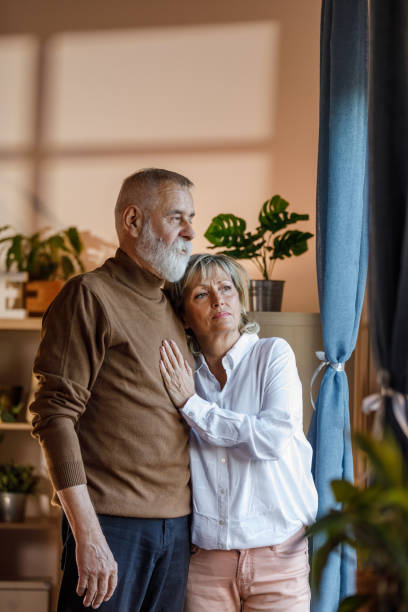 istock Romantic mature couple enjoying some cuddles and bonding 1936922374
