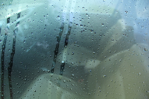 Car windshield and window glass with fog