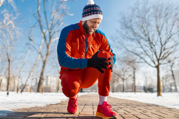istock Young Man With knee Injury 1936946848