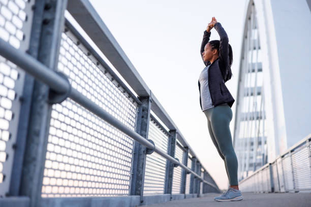 istock Woman stretching out before going for a morning run 1936966422