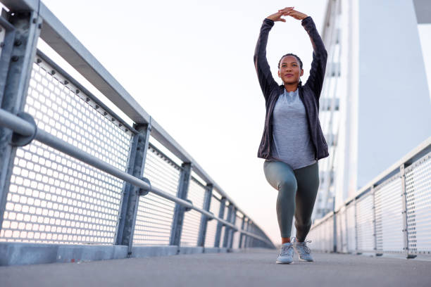 istock Woman stretching out before morning jogging 1936966942