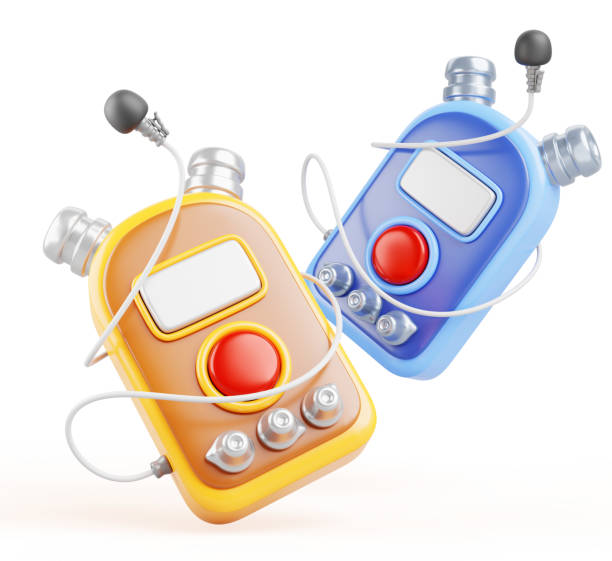 istock Voice recorders with small lavalier microphones 3d render. Isolated blue and yellow dictaphone with lapel mic and cable. Sound recording equipment for audio interview, Cartoon icons 1936974202