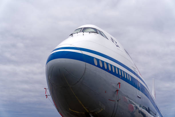 scenic view of china air government airplane parked at swiss airport because of wef word economic forum 2024 visit of chinese prime minister li qiang. - boeing 747 stock-fotos und bilder