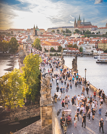 Two the most famous places of Prague in Czech Republic, the Charles bridge and view on Prague Castle.