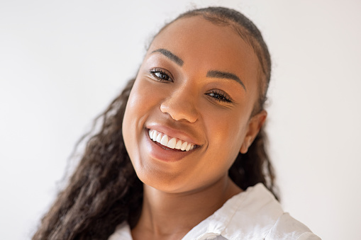 Happy african american head shot portrait